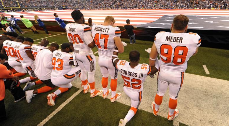 The Cleveland Browns team stand and kneel during the National Anthem before the start of their game against the Indianapolis Colts at Lucas Oil Stadium. The Cleveland Browns team stand and kneel during the National Anthem before the start of their game against the Indianapolis Colts at Lucas Oil Stadium.