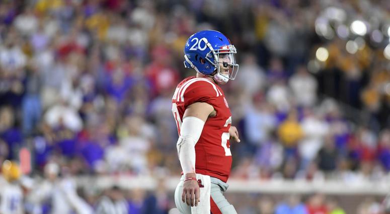Shea Patterson (20) walks off the field after throwing an interception during the fourth quarter against the LSU Tigers at Vaught-Hemingway Stadium. Shea Patterson (20) walks off the field after throwing an interception during the fourth quarter against the LSU Tigers at Vaught-Hemingway Stadium.