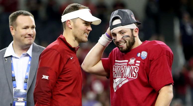 Oklahoma Sooners quarterback Baker Mayfield (6) and Oklahoma Sooners head coach Lincoln Riley celebrate after the Big 12 Championship game against the TCU Horned Frogs at AT&T Stadium.