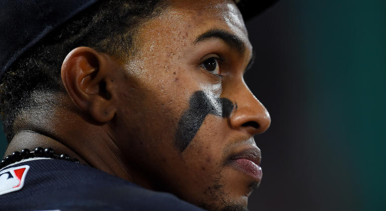 Apr 2, 2018; Anaheim, CA, USA; Cleveland Indians shortstop Francisco Lindor (12) looks on from the dugout during the game against the Los Angeles Angels at Angel Stadium of Anaheim. Apr 2, 2018; Anaheim, CA, USA; Cleveland Indians shortstop Francisco Lindor (12) looks on from the dugout during the game against the Los Angeles Angels at Angel Stadium of Anaheim.