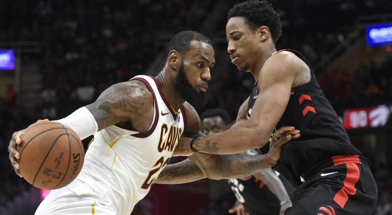 Cavaliers forward LeBron James (23) drives against Toronto Raptors guard DeMar DeRozan (10 Cavaliers forward LeBron James (23) drives against Toronto Raptors guard DeMar DeRozan (10