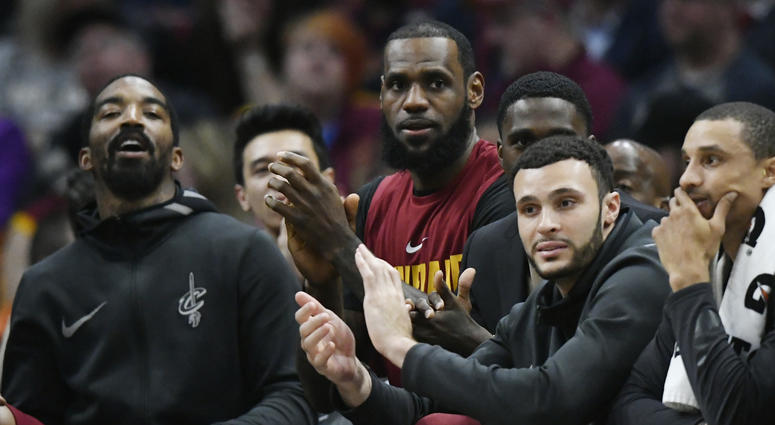 Apr 11, 2018; Cleveland, OH, USA; Cleveland Cavaliers forward LeBron James (center) sits on the bench in the fourth quarter against the New York Knicks at Quicken Loans Arena. Apr 11, 2018; Cleveland, OH, USA; Cleveland Cavaliers forward LeBron James (center) sits on the bench in the fourth quarter against the New York Knicks at Quicken Loans Arena.