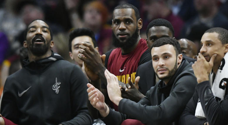 Apr 11, 2018; Cleveland, OH, USA; Cleveland Cavaliers forward LeBron James (center) sits on the bench in the fourth quarter against the New York Knicks at Quicken Loans Arena. Apr 11, 2018; Cleveland, OH, USA; Cleveland Cavaliers forward LeBron James (center) sits on the bench in the fourth quarter against the New York Knicks at Quicken Loans Arena.