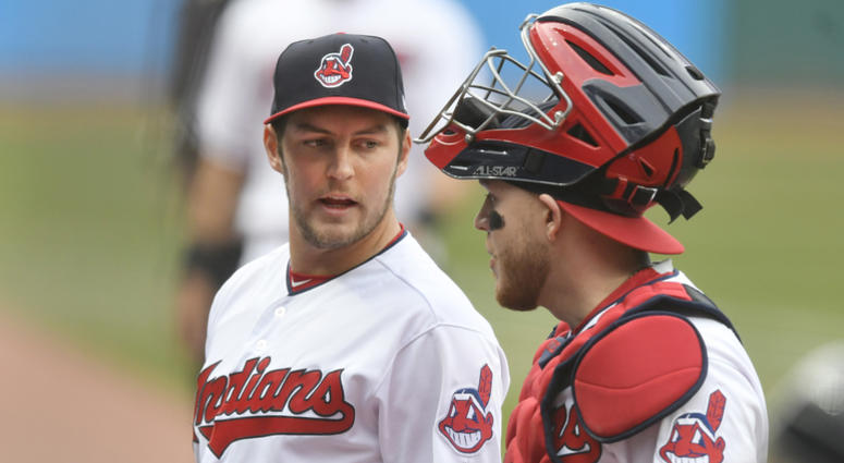 Apr 12, 2018; Cleveland, OH, USA; Cleveland Indians starting pitcher Trevor Bauer (47) walks to the dugout with catcher Roberto Perez (55) in the first inning at Progressive Field. Apr 12, 2018; Cleveland, OH, USA; Cleveland Indians starting pitcher Trevor Bauer (47) walks to the dugout with catcher Roberto Perez (55) in the first inning at Progressive Field.