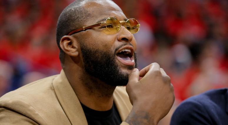 New Orleans Pelicans center DeMarcus Cousins watches from the bench during the second half in game four of the first round of the 2018 NBA Playoffs against the Portland Trail Blazers New Orleans Pelicans center DeMarcus Cousins watches from the bench during the second half in game four of the first round of the 2018 NBA Playoffs against the Portland Trail Blazers