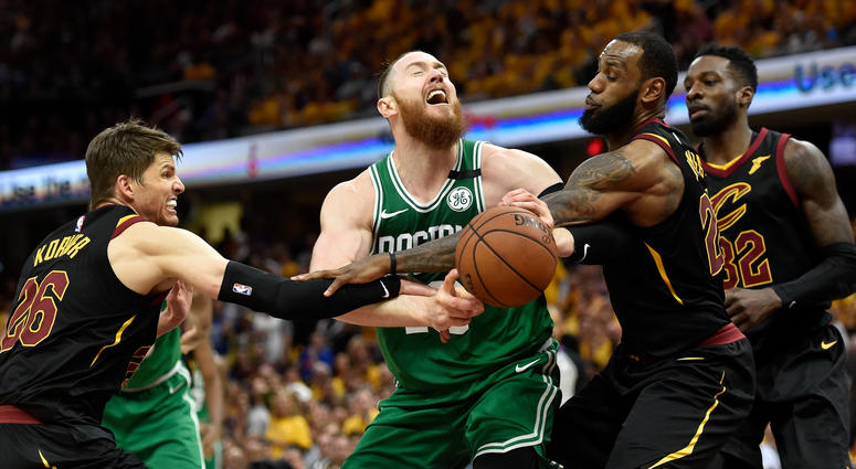Boston Celtics center Aron Baynes (46) is fouled by Cleveland Cavaliers guard Kyle Korver (26) in front of forward LeBron James (23) and Cleveland Cavaliers forward Jeff Green (32) during the forth quarter in game four of the Eastern conference finals of Boston Celtics center Aron Baynes (46) is fouled by Cleveland Cavaliers guard Kyle Korver (26) in front of forward LeBron James (23) and Cleveland Cavaliers forward Jeff Green (32) during the forth quarter in game four of the Eastern conference finals of