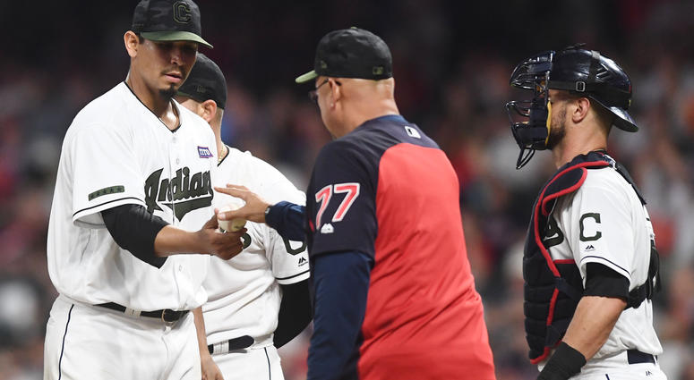 Cleveland Indians manager Terry Francona (77) relieves Cleveland Indians starting pitcher Carlos Carrasco (59) during the sixth inning against the Houston Astros at Progressive Field. Cleveland Indians manager Terry Francona (77) relieves Cleveland Indians starting pitcher Carlos Carrasco (59) during the sixth inning against the Houston Astros at Progressive Field.
