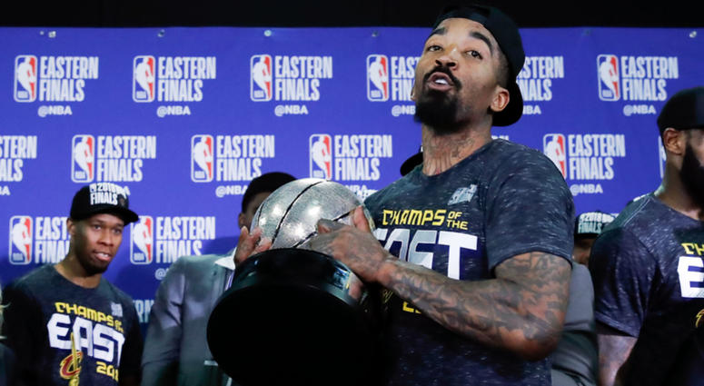 Cleveland Cavaliers guard JR Smith (5) picks up the Eastern Conference trophy after defeating the Boston Celtics in the 2018 NBA Playoffs at TD Garde Cleveland Cavaliers guard JR Smith (5) picks up the Eastern Conference trophy after defeating the Boston Celtics in the 2018 NBA Playoffs at TD Garde