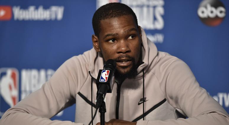 Jun 6, 2018; Cleveland, OH, USA; Golden State Warriors forward Kevin Durant (35) speaks to the media after game three of the 2018 NBA Finals at Quicken Loans Arena. Jun 6, 2018; Cleveland, OH, USA; Golden State Warriors forward Kevin Durant (35) speaks to the media after game three of the 2018 NBA Finals at Quicken Loans Arena.