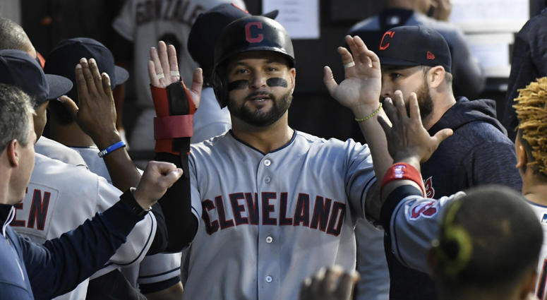 Jun 11, 2018; Chicago, IL, USA; Cleveland Indians first baseman Yonder Alonso (17)is greeted by his teammates after scoring against the Chicago White Sox during the fourth inning at Guaranteed Rate Field. Jun 11, 2018; Chicago, IL, USA; Cleveland Indians first baseman Yonder Alonso (17)is greeted by his teammates after scoring against the Chicago White Sox during the fourth inning at Guaranteed Rate Field.