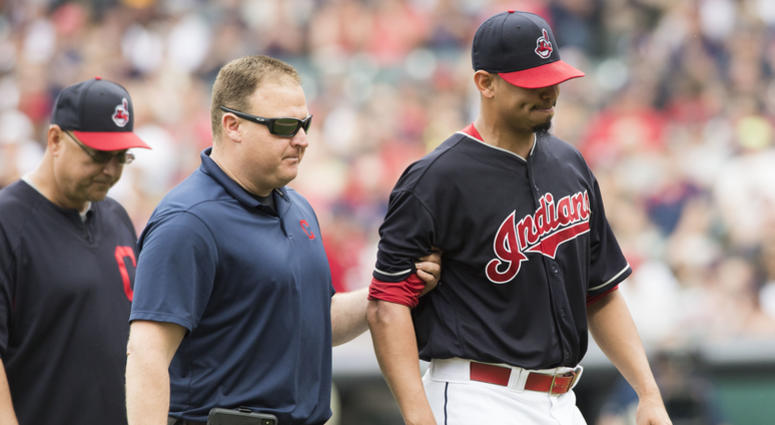 Jun 16, 2018; Cleveland, OH, USA; Cleveland Indians starting pitcher Carlos Carrasco (59) is led off the field after being injured during the second inning against the Minnesota Twins at Progressive Field. Jun 16, 2018; Cleveland, OH, USA; Cleveland Indians starting pitcher Carlos Carrasco (59) is led off the field after being injured during the second inning against the Minnesota Twins at Progressive Field.