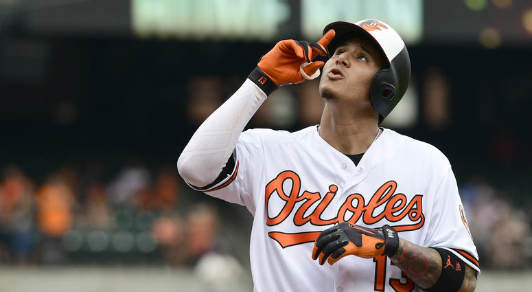 Baltimore Orioles shortstop Manny Machado (13) celebrates after hitting a solo home run in the first inning against the Texas Rangers at Oriole Park at Camden Yards. Baltimore Orioles shortstop Manny Machado (13) celebrates after hitting a solo home run in the first inning against the Texas Rangers at Oriole Park at Camden Yards.