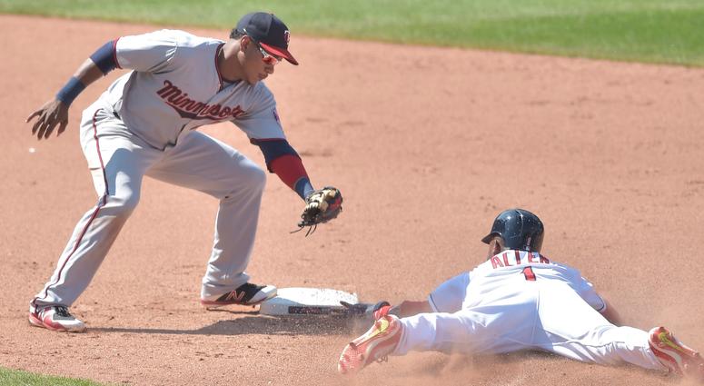 Aug 9, 2018; Cleveland, OH, USA; Cleveland Indians center fielder Greg Allen (1) steals second base beside Minnesota Twins shortstop Jorge Polanco (11) in the ninth inning at Progressive Field. Aug 9, 2018; Cleveland, OH, USA; Cleveland Indians center fielder Greg Allen (1) steals second base beside Minnesota Twins shortstop Jorge Polanco (11) in the ninth inning at Progressive Field.