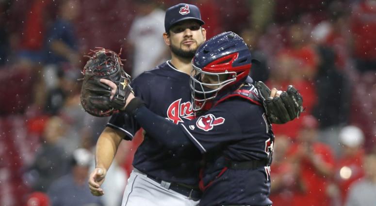 Aug 15, 2018; Cincinnati, OH, USA; Cleveland Indians relief pitcher Brad Hand (33) and catcher Roberto Perez (55) congratulate each other after the Indians beat the Cincinnati Reds at Great American Ball Park. Mandatory Credit: David Kohl-USA TODAY Sports Aug 15, 2018; Cincinnati, OH, USA; Cleveland Indians relief pitcher Brad Hand (33) and catcher Roberto Perez (55) congratulate each other after the Indians beat the Cincinnati Reds at Great American Ball Park. Mandatory Credit: David Kohl-USA TODAY Sports