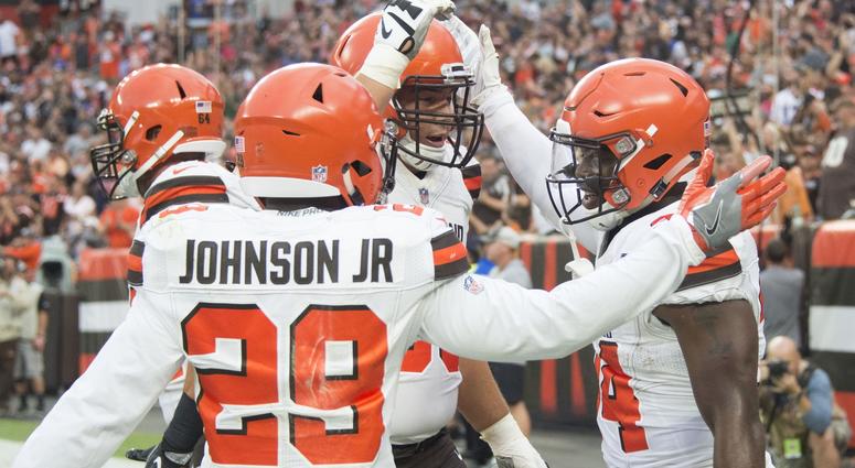 Cleveland Browns running back Carlos Hyde, right, celebrates his first quarter touchdown with running back Duke Johnson (29) and center JC Tretter (64) against the Buffalo Bills at FirstEnergy Stadium. Cleveland Browns running back Carlos Hyde, right, celebrates his first quarter touchdown with running back Duke Johnson (29) and center JC Tretter (64) against the Buffalo Bills at FirstEnergy Stadium.