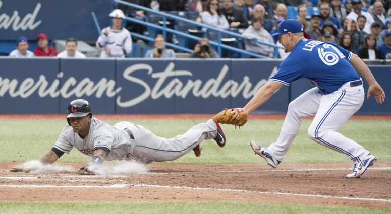Sep 8, 2018; Toronto, Ontario, CAN; Cleveland Indians third baseman Jose Ramirez (11) slides into home plate ahead of the tag from Toronto Blue Jays relief pitcher Mark Leiter Jr. (62) during the sixth inning at Rogers Centre. Sep 8, 2018; Toronto, Ontario, CAN; Cleveland Indians third baseman Jose Ramirez (11) slides into home plate ahead of the tag from Toronto Blue Jays relief pitcher Mark Leiter Jr. (62) during the sixth inning at Rogers Centre.