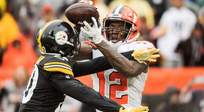 Cleveland Browns wide receiver Josh Gordon (12) catches a touchdown as Pittsburgh Steelers cornerback Cameron Sutton (20) defends during the fourth quarter at FirstEnergy Stadium. Cleveland Browns wide receiver Josh Gordon (12) catches a touchdown as Pittsburgh Steelers cornerback Cameron Sutton (20) defends during the fourth quarter at FirstEnergy Stadium.