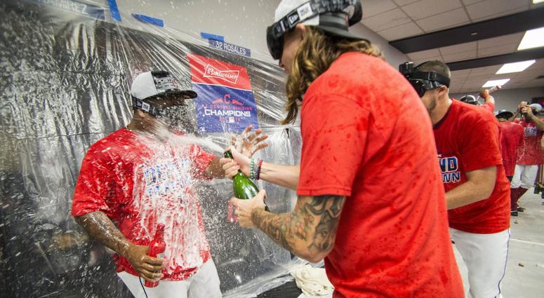 Sep 15, 2018; Cleveland, OH, USA; Cleveland Indians starting pitcher Mike Clevinger (middle) and second baseman Jose Ramirez (left) and starting pitcher Trevor Bauer (right) celebrate after defeating the Detroit Tigers to clinch the American League Centra Sep 15, 2018; Cleveland, OH, USA; Cleveland Indians starting pitcher Mike Clevinger (middle) and second baseman Jose Ramirez (left) and starting pitcher Trevor Bauer (right) celebrate after defeating the Detroit Tigers to clinch the American League Centra