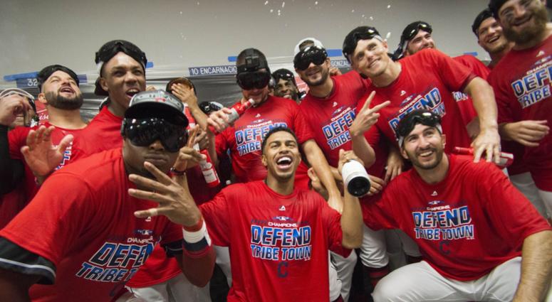 Sep 15, 2018; Cleveland, OH, USA; Members of the Cleveland Indians including shortstop Francisco Lindor (center) and center fielder Rajai Davis (left) celebrate after defeating the Detroit Tigers to clinch the American League Central Division at Progressi Sep 15, 2018; Cleveland, OH, USA; Members of the Cleveland Indians including shortstop Francisco Lindor (center) and center fielder Rajai Davis (left) celebrate after defeating the Detroit Tigers to clinch the American League Central Division at Progressi