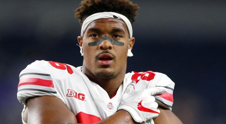 Ohio State Buckeyes defensive tackle Dre'Mont Jones (86) looks on from the field before a game against the TCU Horned Frogs at AT&T Stadium.