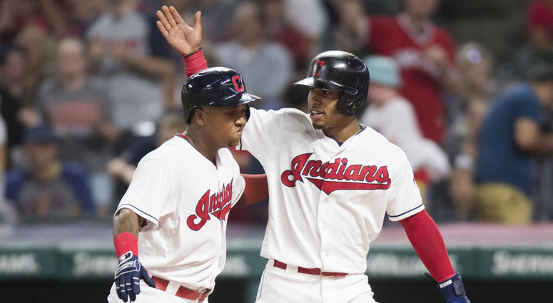 Sep 21, 2018; Cleveland, OH, USA; Cleveland Indians shortstop Francisco Lindor, right, celebrates with second baseman Jose Ramirez (11) after scoring on a sacrifice fly by Ramirez during the fifth inning against the Boston Red Sox at Progressive Field. Ma Sep 21, 2018; Cleveland, OH, USA; Cleveland Indians shortstop Francisco Lindor, right, celebrates with second baseman Jose Ramirez (11) after scoring on a sacrifice fly by Ramirez during the fifth inning against the Boston Red Sox at Progressive Field. Ma