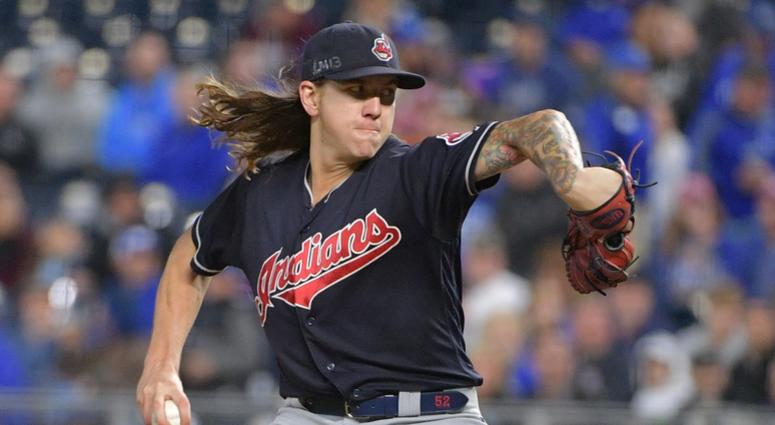 Sep 28, 2018; Kansas City, MO, USA; Cleveland Indians starting pitcher Mike Clevinger (52) delivers a pitch in the first inning against the Kansas City Royals at Kauffman Stadium. Mandatory Credit: Denny Medley-USA TODAY Sports Sep 28, 2018; Kansas City, MO, USA; Cleveland Indians starting pitcher Mike Clevinger (52) delivers a pitch in the first inning against the Kansas City Royals at Kauffman Stadium. Mandatory Credit: Denny Medley-USA TODAY Sports