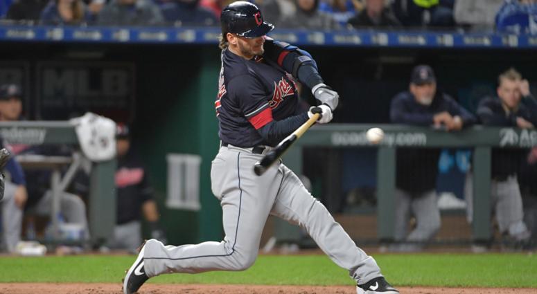 Cleveland Indians third baseman Josh Donaldson (27) connects for a double in the seventh inning against the Kansas City Royals at Kauffman Stadium. Cleveland Indians third baseman Josh Donaldson (27) connects for a double in the seventh inning against the Kansas City Royals at Kauffman Stadium.