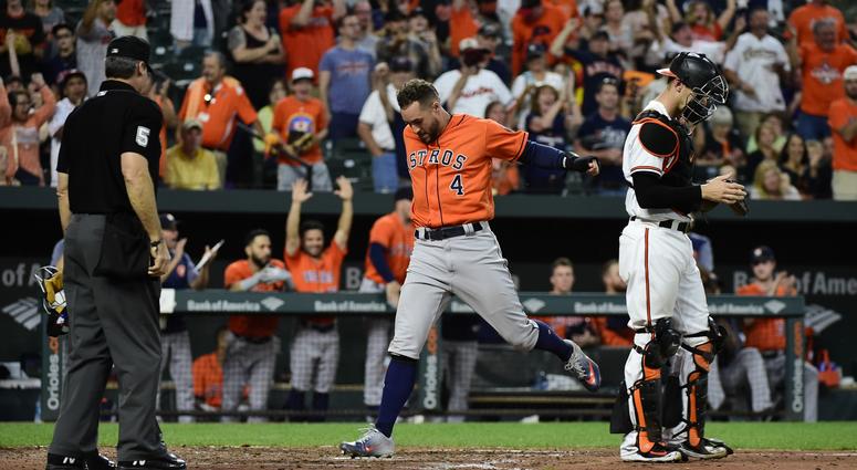 Houston Astros center fielder George Springer (4) scores on Houston Astros shortstop Carlos Correa (not pictured) rbi double in the ninth inning \H| at Oriole Park at Camden Yards. Houston Astros center fielder George Springer (4) scores on Houston Astros shortstop Carlos Correa (not pictured) rbi double in the ninth inning \H| at Oriole Park at Camden Yards.