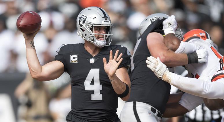 Oakland Raiders quarterback Derek Carr (4) passes the football against the Cleveland Browns during the second quarter at Oakland Coliseum. Derek Carr Oakland Raiders Cleveland Browns