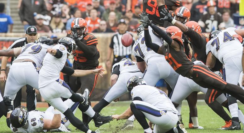 Cleveland Browns cornerback Denzel Ward (21) blocks the field goal attempt of Baltimore Ravens kicker Justin Tucker (9) during the second quarter at FirstEnergy Stadium. Denzel Ward Cleveland Browns