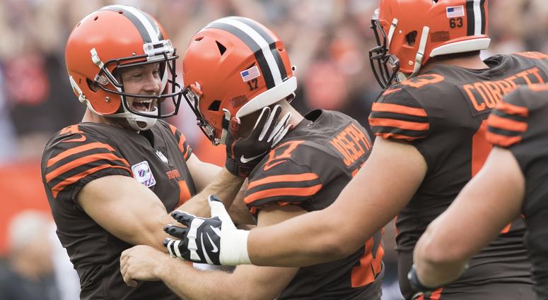 Cleveland Browns punter Britton Colquitt (4) celebrates with kicker Greg Joseph (17) after Joseph kicked the game winning field in overtime against the Baltimore Ravens at FirstEnergy Stadium. Greg Joseph Cleveland Browns Baltimore Ravens game winner