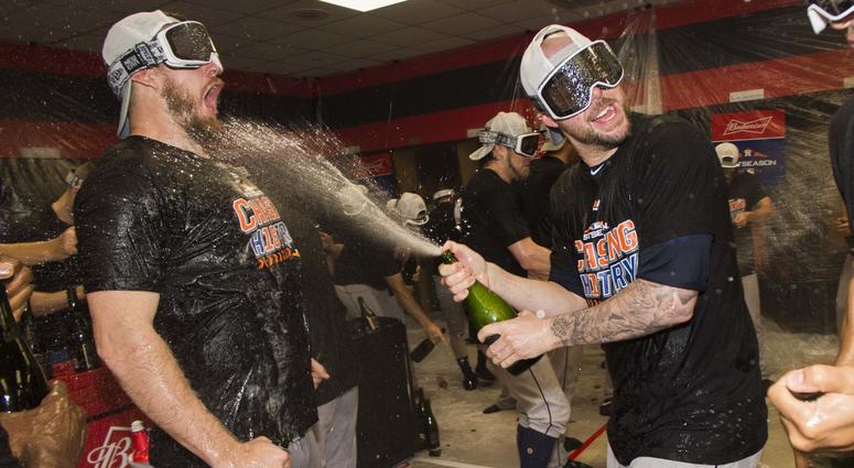 Oct 8, 2018; Cleveland, OH, USA; Members of the Houston Astros celebrate in the locker room after game three of the 2018 ALDS playoff baseball series against the Cleveland Indians at Progressive Field. Oct 8, 2018; Cleveland, OH, USA; Members of the Houston Astros celebrate in the locker room after game three of the 2018 ALDS playoff baseball series against the Cleveland Indians at Progressive Field.