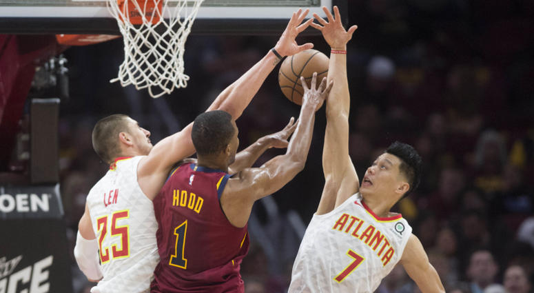 Oct 21, 2018; Cleveland, OH, USA; Atlanta Hawks center Alex Len (25) and guard Jeremy Lin (7) block the shot of Cleveland Cavaliers guard Rodney Hood (1) during the first half at Quicken Loans Arena. Oct 21, 2018; Cleveland, OH, USA; Atlanta Hawks center Alex Len (25) and guard Jeremy Lin (7) block the shot of Cleveland Cavaliers guard Rodney Hood (1) during the first half at Quicken Loans Arena.