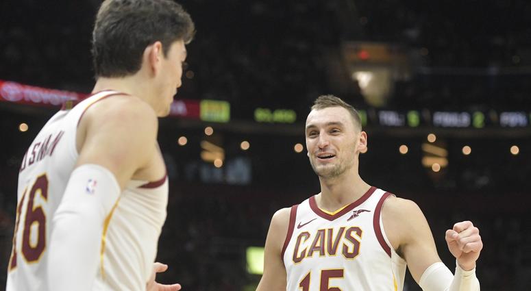 Cleveland Cavaliers forward Sam Dekker (15) celebrates with forward Cedi Osman (16) in the third quarter against the Atlanta Hawks at Quicken Loans Arena. Cleveland Cavaliers forward Sam Dekker (15) celebrates with forward Cedi Osman (16) in the third quarter against the Atlanta Hawks at Quicken Loans Arena.