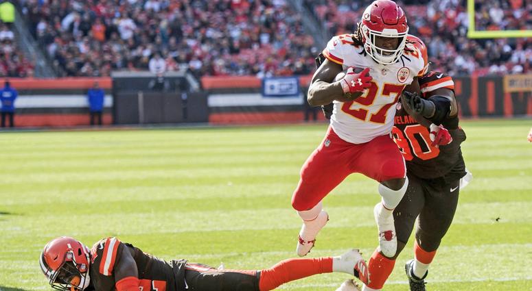 Kansas City Chiefs running back Kareem Hunt (27) eludes the tackle of Cleveland Browns free safety Jabrill Peppers (22) during the first half at FirstEnergy Stadium. Kareem Hunt scores touchdown against Cleveland Browns