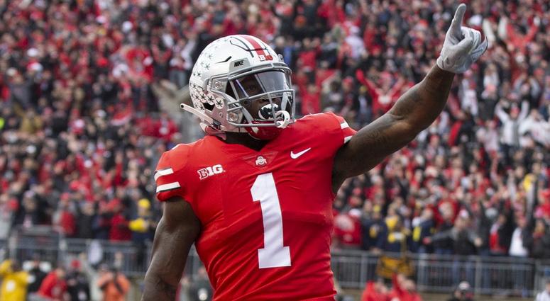 Ohio State Buckeyes wide receiver Johnnie Dixon (1) celebrates after scoring a touchdown against the Michigan Wolverines in the second quarter at Ohio Stadium. Johnnie Dixon Ohio State