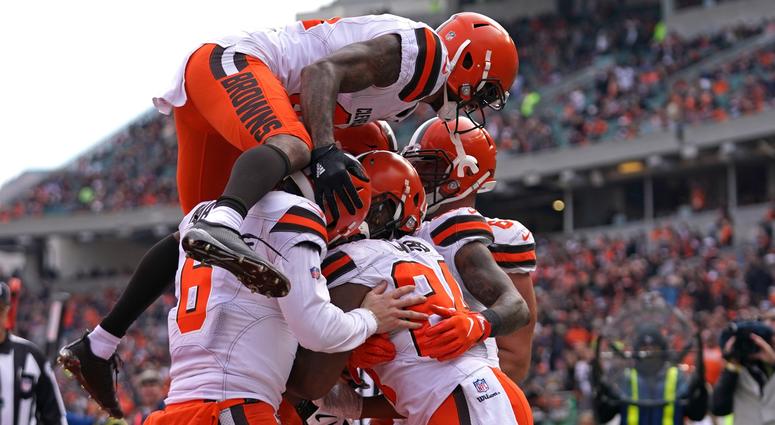Cleveland Browns running back Nick Chubb (24) celebrates with teammates after scoring a touchdown against the Cincinnati Bengals in the first half at Paul Brown Stadium.