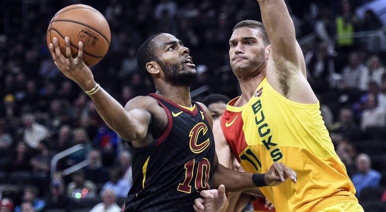 Dec 10, 2018; Milwaukee, WI, USA; Cleveland Cavaliers guard Alec Burks (10) takes a shot against Milwaukee Bucks center Brook Lopez (11) in the third quarter at the Fiserv Forum. Mandatory Credit: Benny Sieu-USA TODAY Sports Dec 10, 2018; Milwaukee, WI, USA; Cleveland Cavaliers guard Alec Burks (10) takes a shot against Milwaukee Bucks center Brook Lopez (11) in the third quarter at the Fiserv Forum. Mandatory Credit: Benny Sieu-USA TODAY Sports