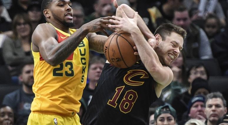 Dec 10, 2018; Milwaukee, WI, USA; Milwaukee Bucks guard Sterling Brown (23) and Cleveland Cavaliers guard Matthew Dellavedova (8) battle for a rebound in the third quarter at the Fiserv Forum. Mandatory Credit: Benny Sieu-USA TODAY Sports Dec 10, 2018; Milwaukee, WI, USA; Milwaukee Bucks guard Sterling Brown (23) and Cleveland Cavaliers guard Matthew Dellavedova (8) battle for a rebound in the third quarter at the Fiserv Forum. Mandatory Credit: Benny Sieu-USA TODAY Sports