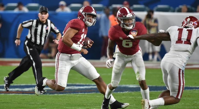Alabama Crimson Tide quarterback Tua Tagovailoa (13) runs with the ball against the Oklahoma Sooners during the second half of the 2018 Orange Bowl college football playoff semifinal game at Hard Rock Stadium. Alabama Crimson Tide quarterback Tua Tagovailoa (13) runs with the ball against the Oklahoma Sooners during the second half of the 2018 Orange Bowl college football playoff semifinal game at Hard Rock Stadium.