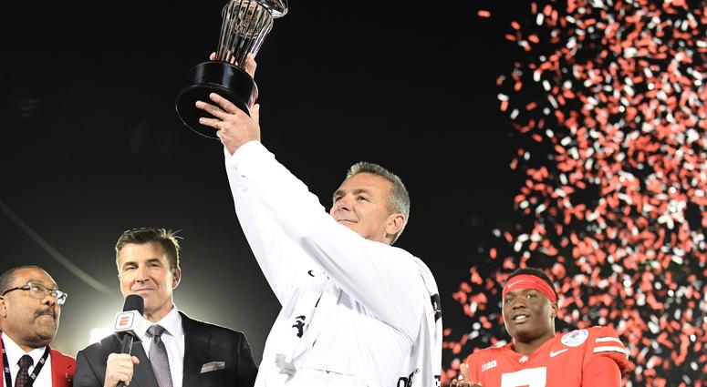 Jan 1, 2019; Pasadena, CA, USA; Ohio State Buckeyes head coach Urban Meyer celebrates with the Rose Bowl trophy after the Ohio State Buckeyes defeated the Washington Huskies in the 2019 Rose Bowl at Rose Bowl Stadium.