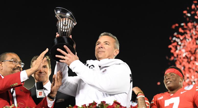Ohio State Buckeyes head coach Urban Meyer celebrates with the Rose Bowl trophy after the Ohio State Buckeyes defeated the Washington Huskies in the 2019 Rose Bowl at Rose Bowl Stadium