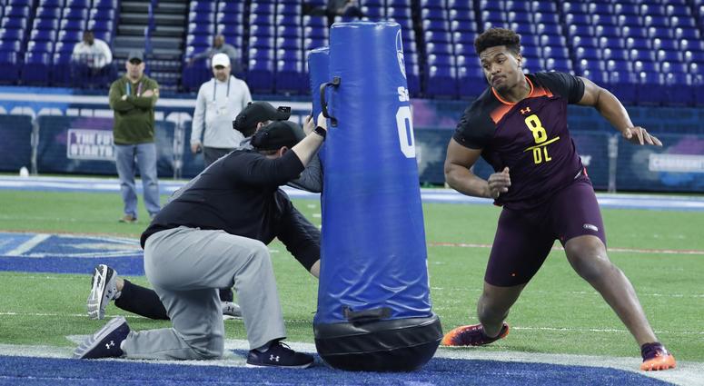 Ohio State defensive lineman Dre'Mont Jones (DL08) goes through workout drills during the 2019 NFL Combine at Lucas Oil Stadium.