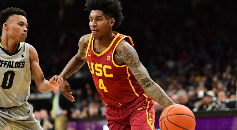 Mar 9, 2019; Boulder, CO, USA; USC Trojans guard Kevin Porter Jr. (4) drives on Colorado Buffaloes guard Shane Gatling (0) in the second half at the CU Events Center Mandatory Credit: Ron Chenoy-USA TODAY Sports Mar 9, 2019; Boulder, CO, USA; USC Trojans guard Kevin Porter Jr. (4) drives on Colorado Buffaloes guard Shane Gatling (0) in the second half at the CU Events Center Mandatory Credit: Ron Chenoy-USA TODAY Sports