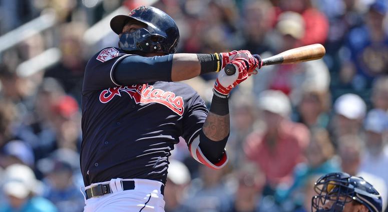 Mar 13, 2019; Goodyear, AZ, USA; Cleveland Indians shortstop Hanley Ramirez (13) hits a two RBI single against the Milwaukee Brewers during the first inning at Goodyear Ballpark. Mandatory Credit: Joe Camporeale-USA TODAY Sports Mar 13, 2019; Goodyear, AZ, USA; Cleveland Indians shortstop Hanley Ramirez (13) hits a two RBI single against the Milwaukee Brewers during the first inning at Goodyear Ballpark. Mandatory Credit: Joe Camporeale-USA TODAY Sports