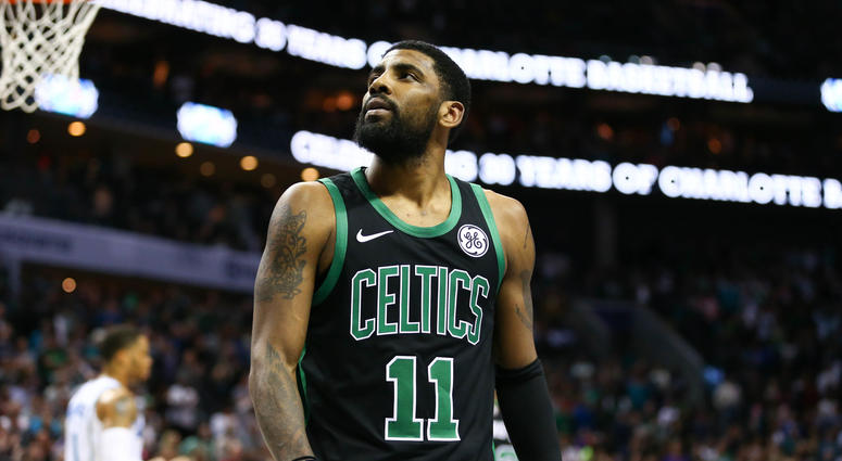 Mar 23, 2019; Charlotte, NC, USA; Boston Celtics guard Kyrie Irving (11) watches a replay after a foul in the second half against the Charlotte Hornets at Spectrum Center. Mandatory Credit: Jeremy Brevard-USA TODAY Sports Mar 23, 2019; Charlotte, NC, USA; Boston Celtics guard Kyrie Irving (11) watches a replay after a foul in the second half against the Charlotte Hornets at Spectrum Center. Mandatory Credit: Jeremy Brevard-USA TODAY Sports