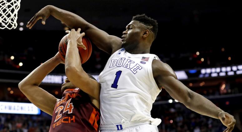 Virginia Tech Hokies forward Kerry Blackshear Jr. (24) is fouled by Duke Blue Devils forward Zion Williamson (1) during the second half in the semifinals of the east regional of the 2019 NCAA Tournament at Capital One Arena. Virginia Tech Hokies forward Kerry Blackshear Jr. (24) is fouled by Duke Blue Devils forward Zion Williamson (1) during the second half in the semifinals of the east regional of the 2019 NCAA Tournament at Capital One Arena.