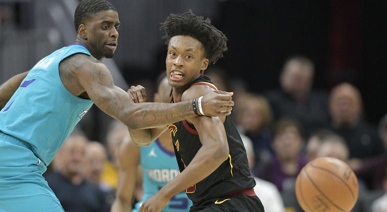Apr 9, 2019; Cleveland, OH, USA; Cleveland Cavaliers guard Collin Sexton (2) loses the ball while defended by Charlotte Hornets guard Dwayne Bacon (7) in the second quarter at Rocket Mortgage FieldHouse
