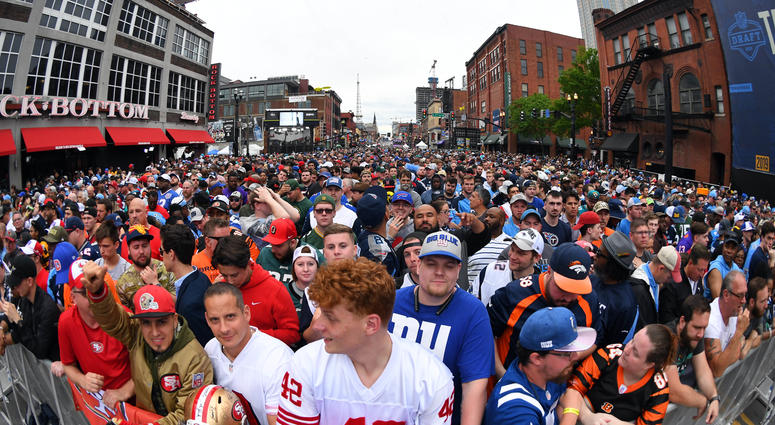 Apr 25, 2019; Nashville, TN, USA; Fans fill Broadway prior to the first round of the 2019 NFL Draft in Downtown Nashville.