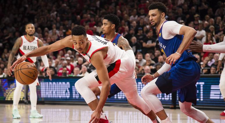 Portland Trail Blazers guard CJ McCollum (3) drives around Denver Nuggets guard Jamal Murray (27) during the second half in game six of the second round of the 2019 NBA Playoffs at Moda Center. The Trail Blazers beat the Nuggets 119-108. Portland Trail Blazers guard CJ McCollum (3) drives around Denver Nuggets guard Jamal Murray (27) during the second half in game six of the second round of the 2019 NBA Playoffs at Moda Center. The Trail Blazers beat the Nuggets 119-108.